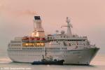 ID 1275 ASTOR (1987/20606grt/IMO 8506373, ex-FEDOR DOSTOEVSKIY) arriving at dawn in Auckland, New Zealand, assisted by the Port of Auckland tug WAIPAPA. ASTOR is operated by Transocean Tours. 